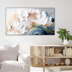 Abstract floral painting on a wall above a sofa and wooden side table with decorative items.