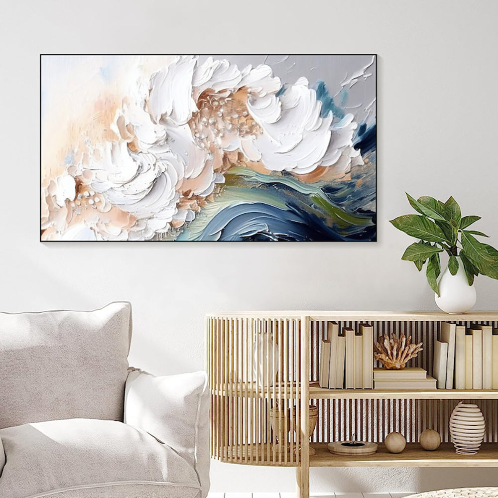 Abstract floral painting on a wall above a sofa and wooden side table with decorative items.