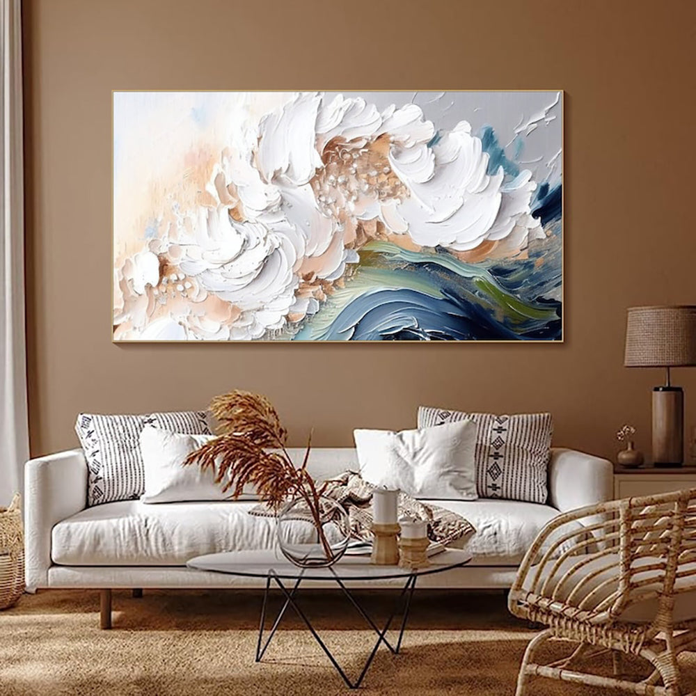 Living room with a large abstract floral painting on the wall, white sofa, and decorative items.