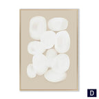 Framed abstract art with white shapes on a beige background