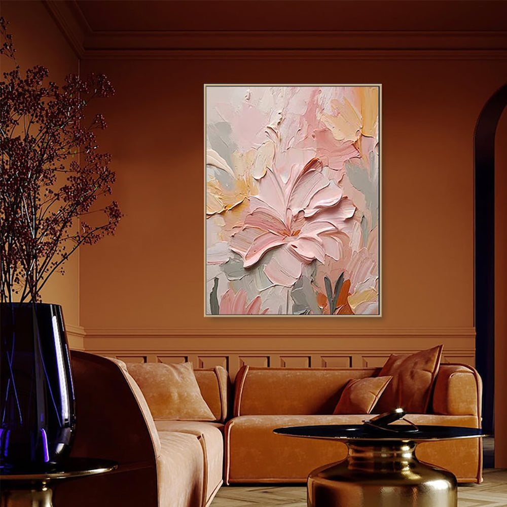 Modern living room with a floral painting on the wall, brown sofa, and decorative elements.