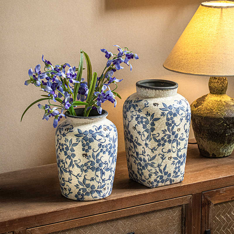 Set of ice-cracked ceramic vases in classic blue-and-white floral pattern