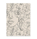 Beige rug with black line art of faces and floral patterns