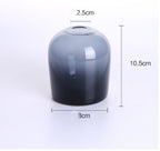 Gradient blue and black cylindrical object with dimensions labeled on a white background