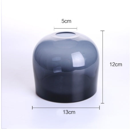 Black cylindrical object with dimensions labeled on a white background