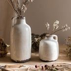 Set of small and large coarse pottery antique vases with rustic textured finish