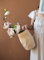 Elegant khaki ceramic vase with hand-pinched texture, perfect for dried flowers
