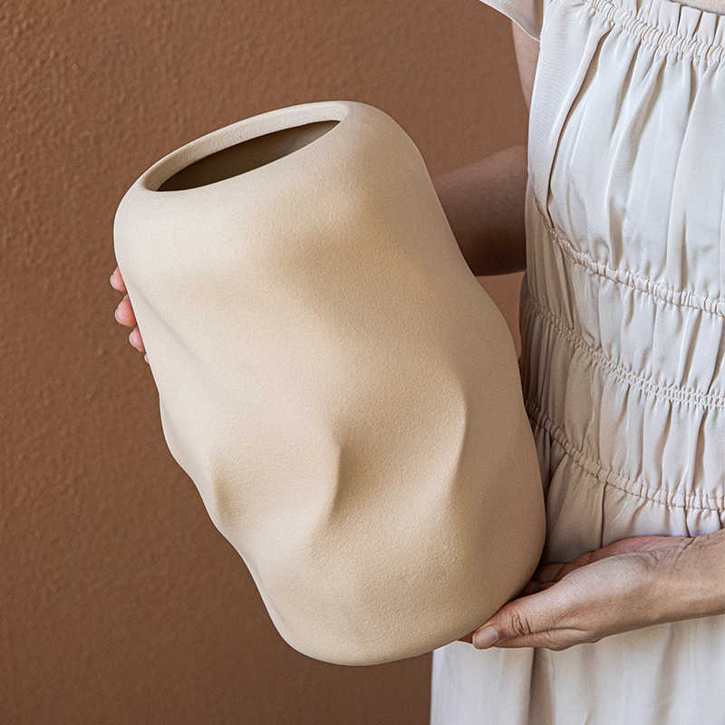Stylish minimalist ceramic vase with hand-pinched details and matte glaze