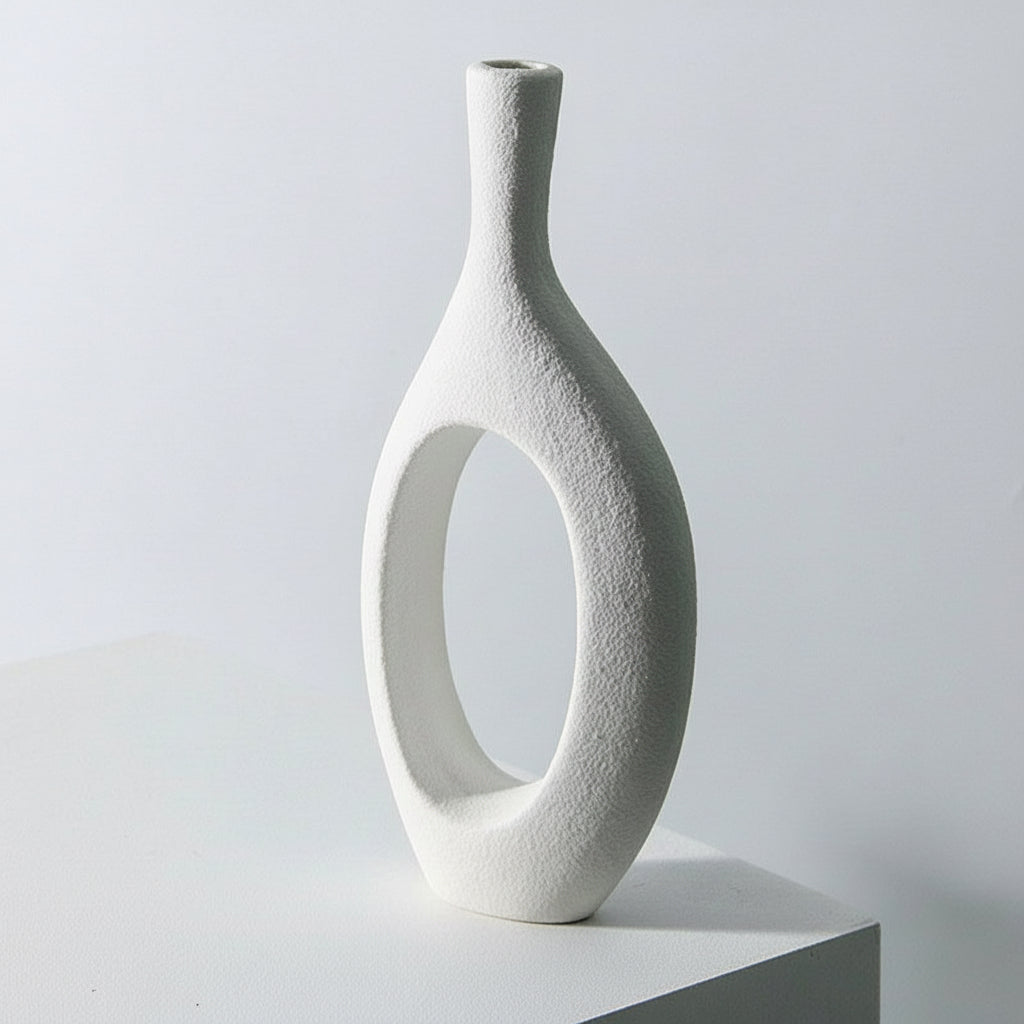 White ceramic vase with dimensions indicated on a light gray background