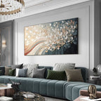 Living room with a blue sofa, decorative pillows, and an abstract painting on the wall.