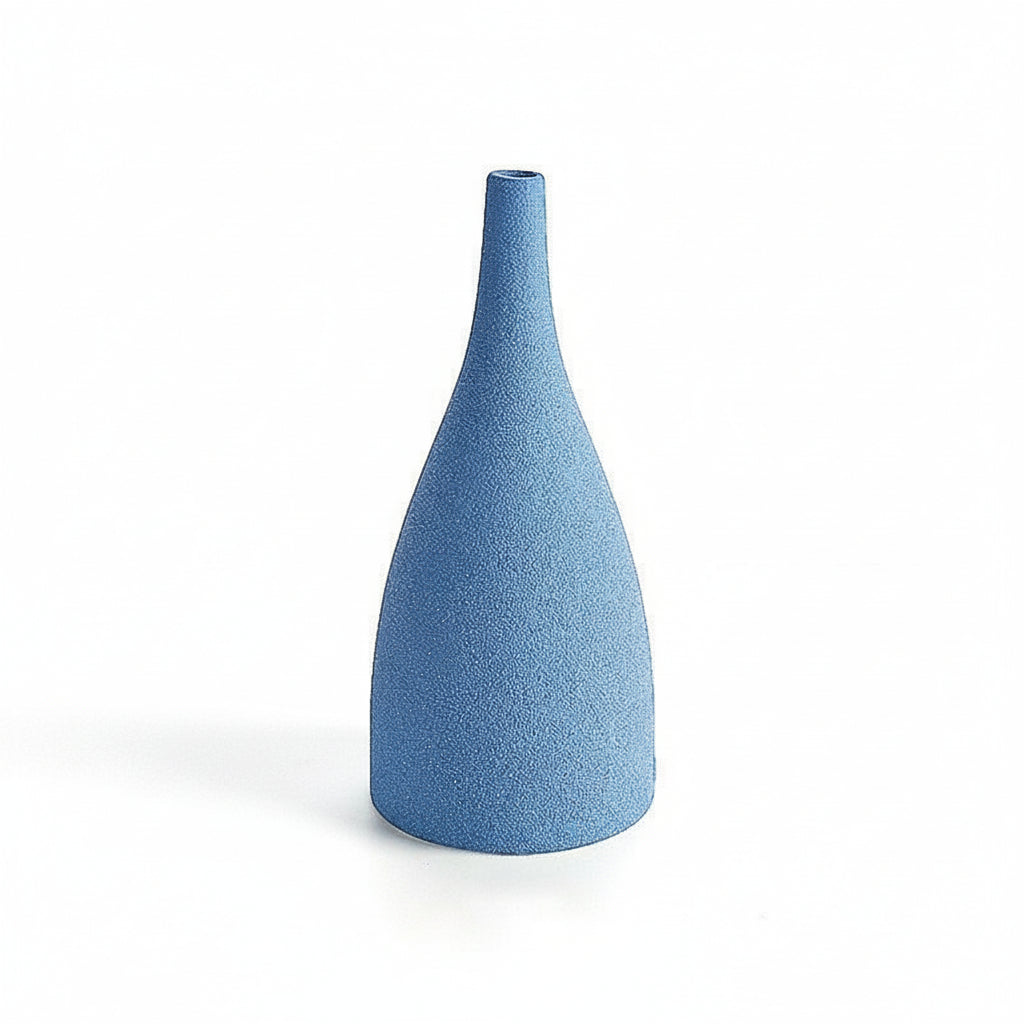 Blue textured vase on a white background with measurement scale.