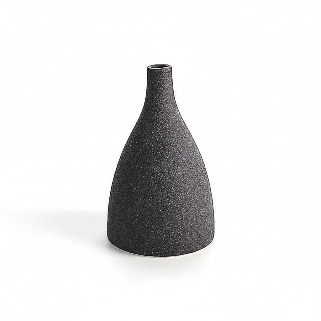 Black textured vase on a white background with measurement lines.