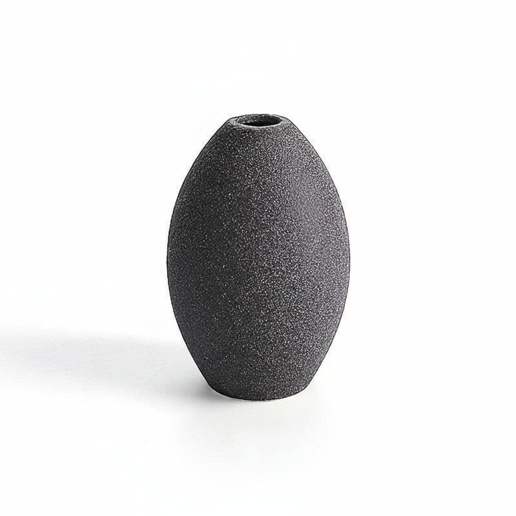 Gray textured vase with measurement lines on a white background