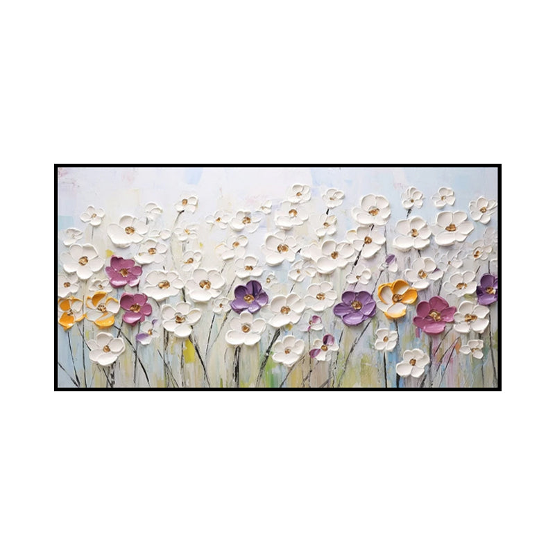 Framed artwork of colorful flowers on a white background