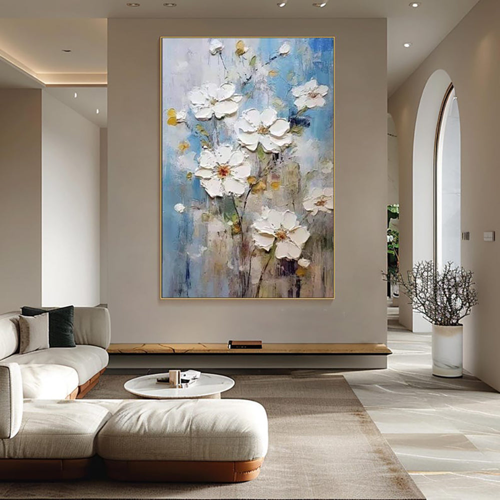 Modern living room with a large abstract floral painting on the wall.