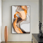Abstract art piece in a modern interior setting with a vase and sculpture.