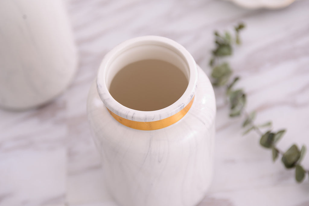 Decorative marbled porcelain vase with gold accents for modern home décor