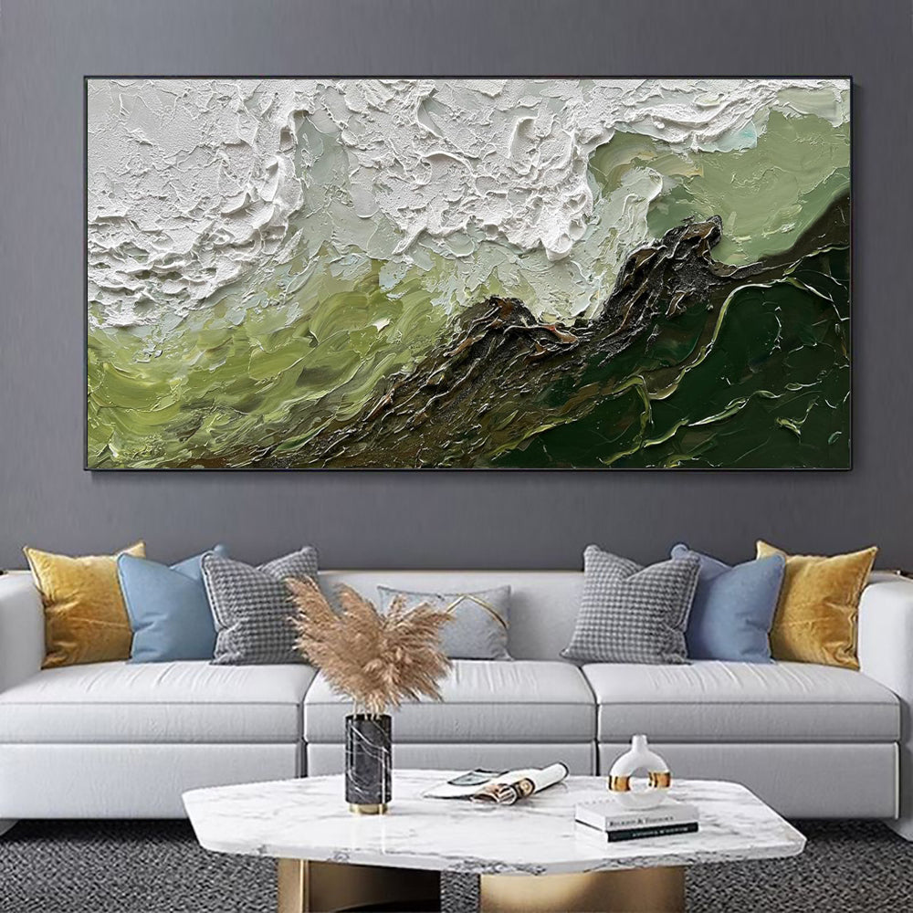 Living room with a large abstract painting on the wall above a gray sofa with colorful pillows.