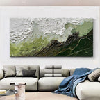 Abstract painting on a wall above a sofa in a living room