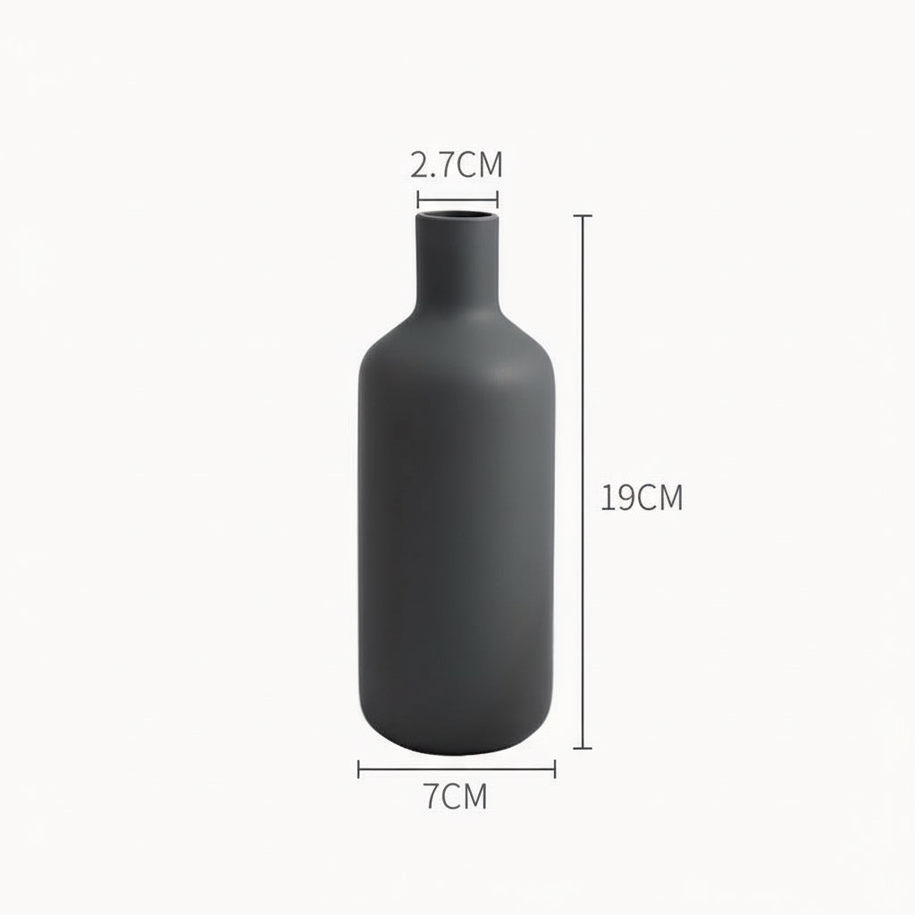 Black vase with dimensions labeled on a white background
