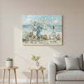 Seashell and flower painting on a wall above a sofa in a living room.