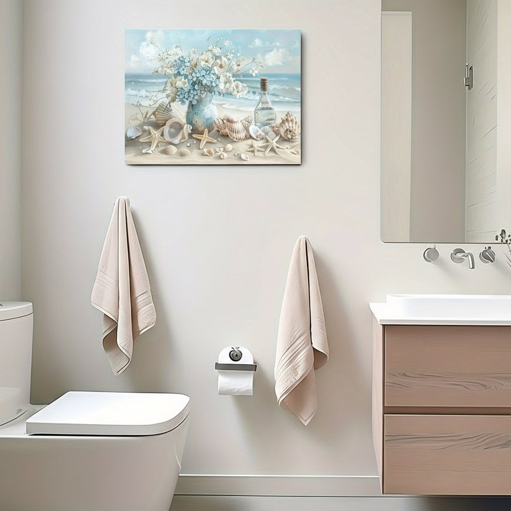 Modern bathroom with a toilet, sink, and decorative painting on the wall.