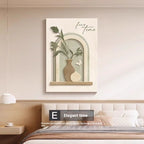 Decorative wall art with plants and text in a bedroom setting