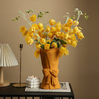 Handcrafted floral vase with minimalist Nordic design and ribbon accent