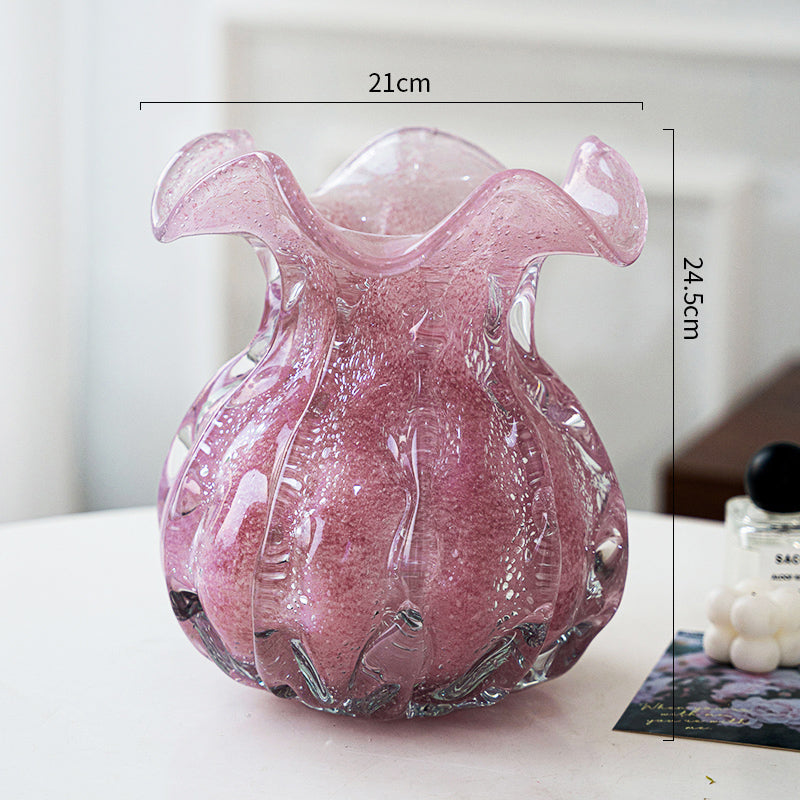 Large handcrafted pink glass vase with organic wavy rim and crushed ice bubble effect, perfect for living room display