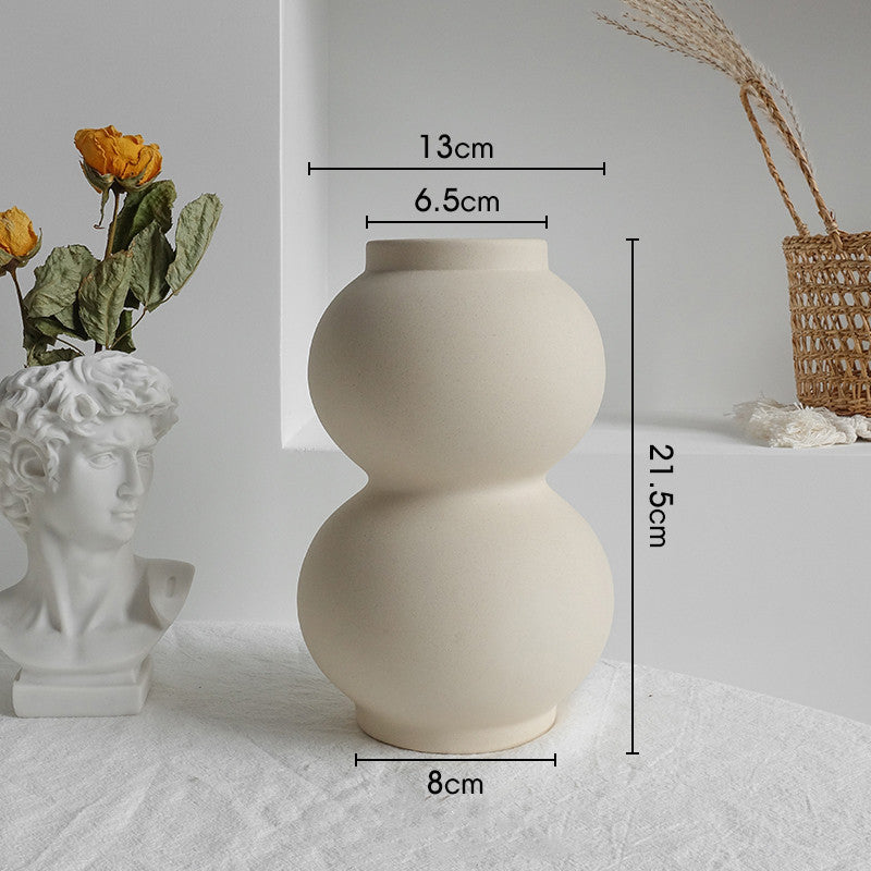 Beige varo vase with matte unglazed ceramic finish, ideal for minimalist interiors