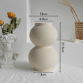 Beige varo vase with matte unglazed ceramic finish, ideal for minimalist interiors
