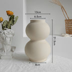 Beige varo vase with matte unglazed ceramic finish, ideal for minimalist interiors