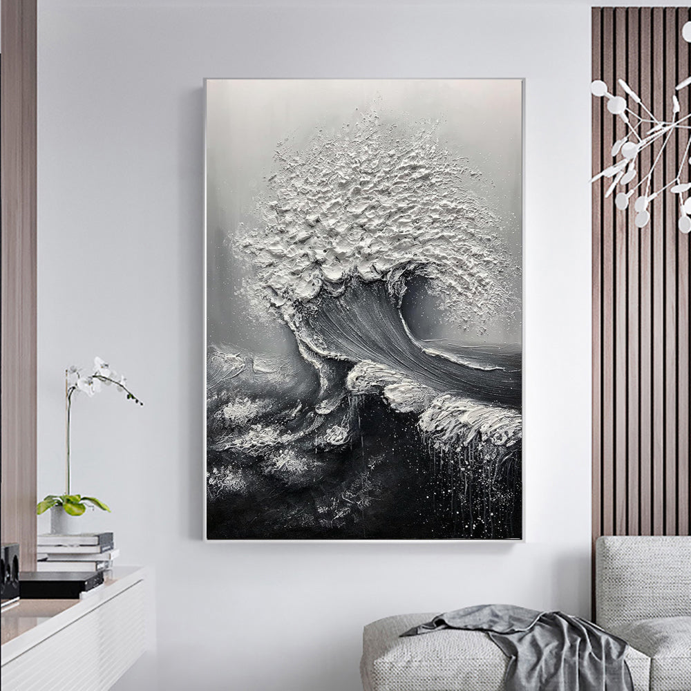 Abstract black and white wave painting in a modern living room.