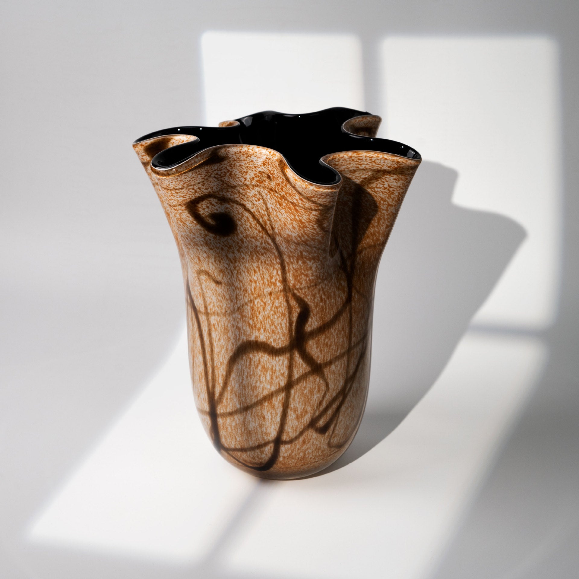 Vintage brown striped marbled glass vase with wavy sculptural rim