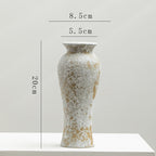 Tall slender glazed vase with textured surface inspired by traditional Chinese pottery