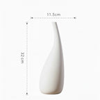 White vase with dimensions indicated on a white background