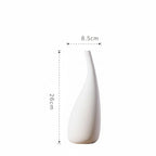 White vase with dimensions labeled on a white background