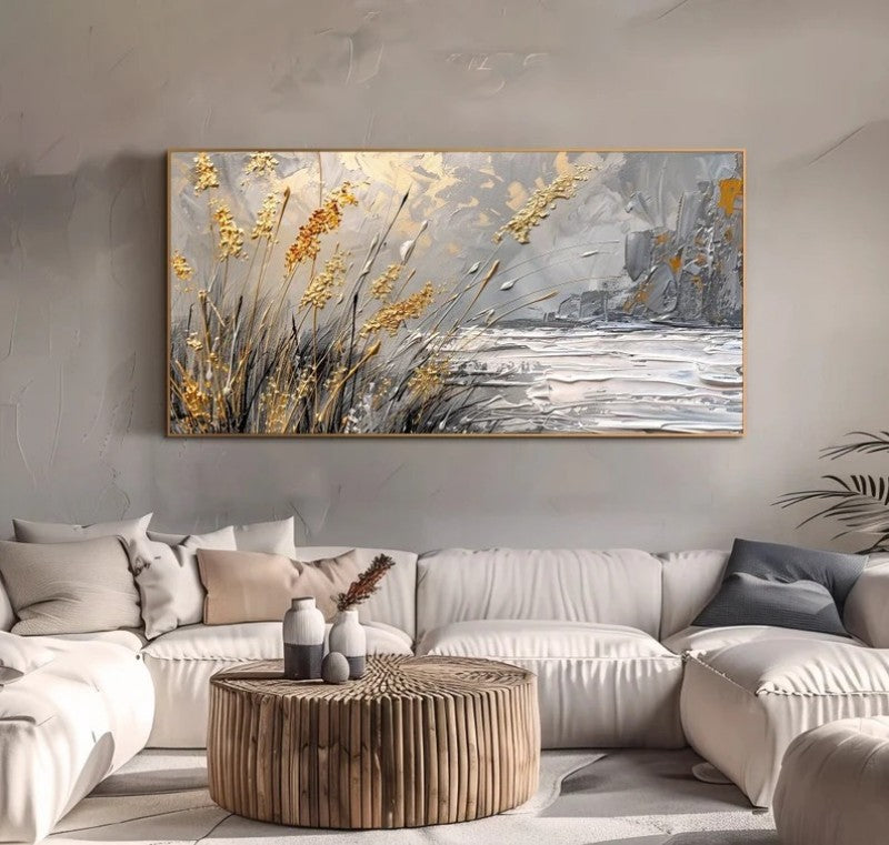Modern living room with a large abstract painting above a beige sectional sofa.