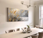 Dining room with a large abstract painting on the wall above a table.