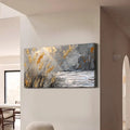 Abstract painting of a landscape with water and plants on a wall in a modern room.